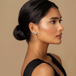 Load image into Gallery viewer, A person viewed from the side wearing a silver stud earring with a heart design.