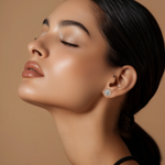 Load image into Gallery viewer, A person wearing a single round silver stud earring.