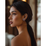 Load image into Gallery viewer, A person viewed from the side wearing the Crimson Rhapsody Ruby Silver Studs earrings.